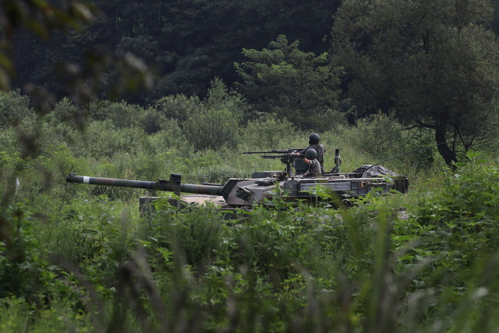 A South Korean army tank takes part in a military exercise near the demilitarized zone separating the two Koreas in Paju